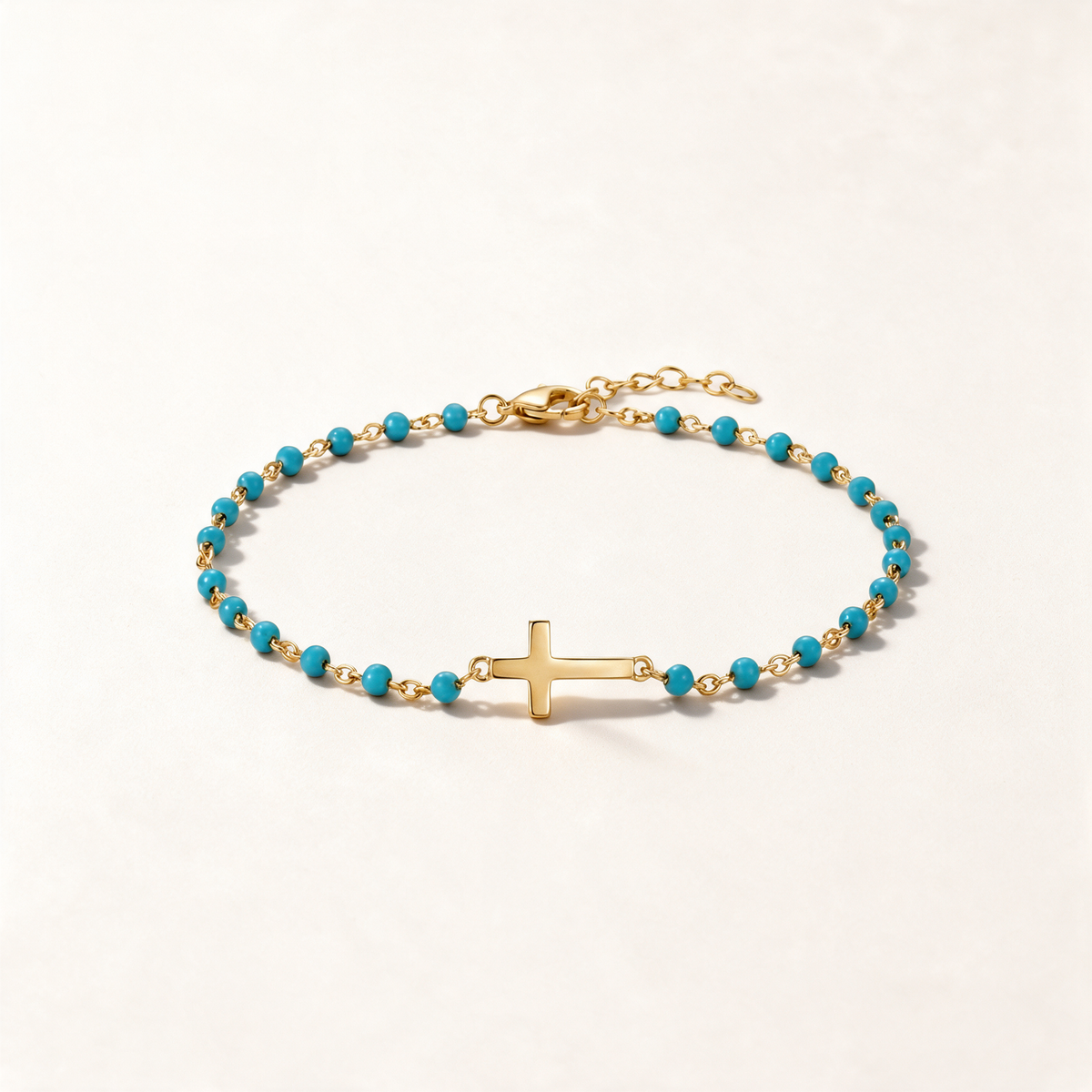 Tres pulsera en oro amarillo de 14 quilates, con eslabones y perlas de piedras preciosas